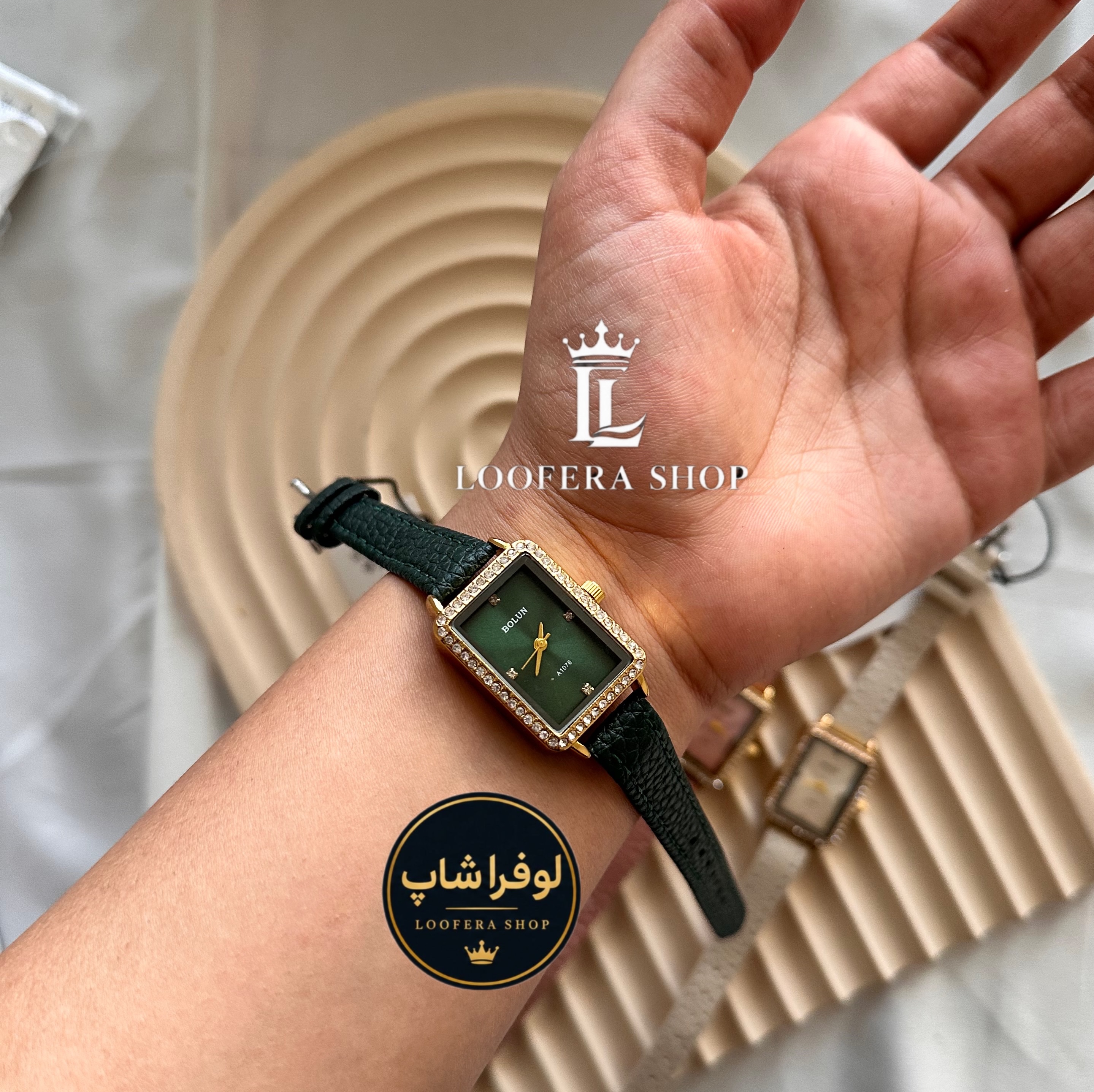 ساعت زنانه بولون بند چرم دور نگین سبز