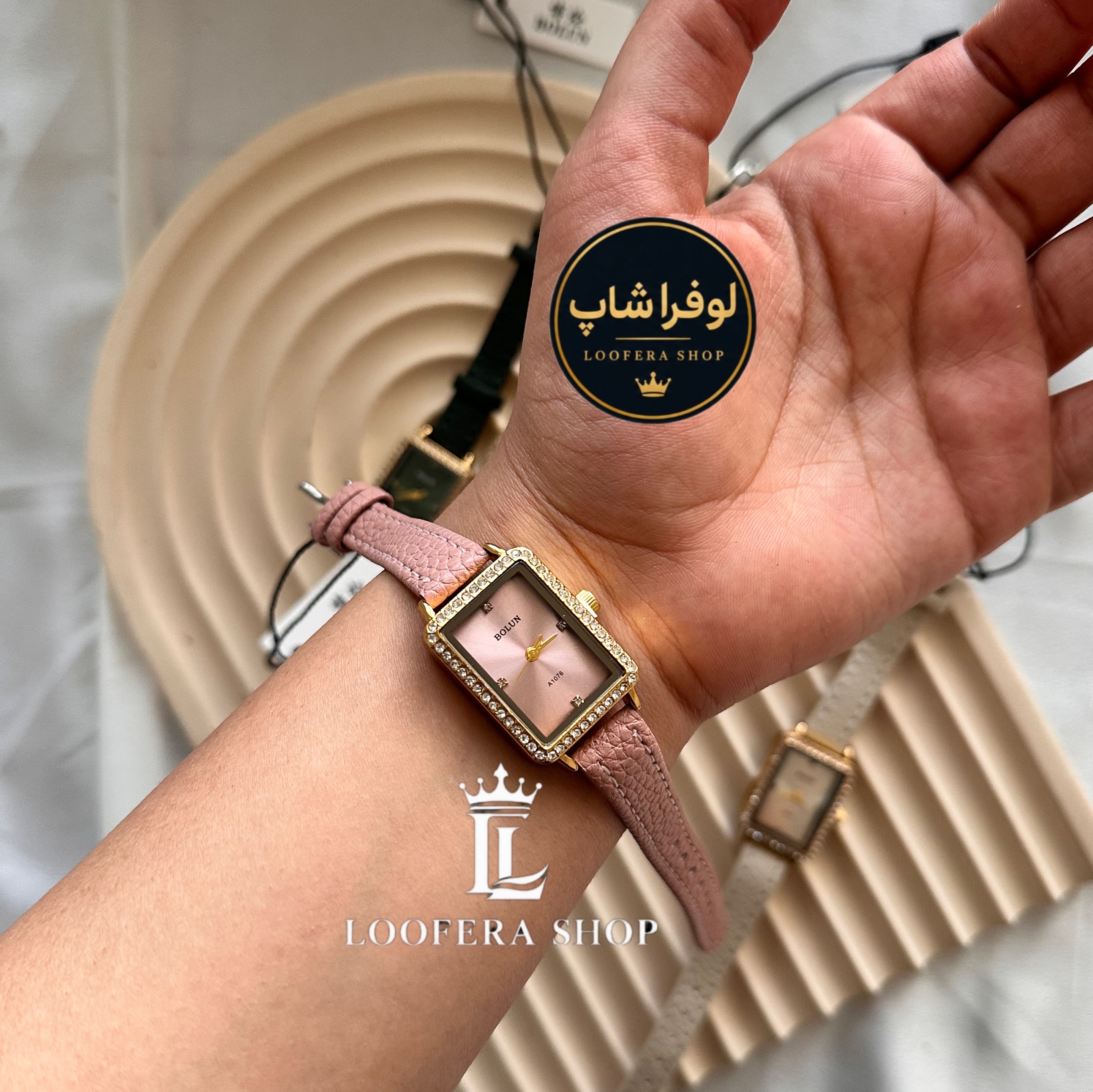 ساعت بند چرمی بولون زنانه دور نگین صورتی