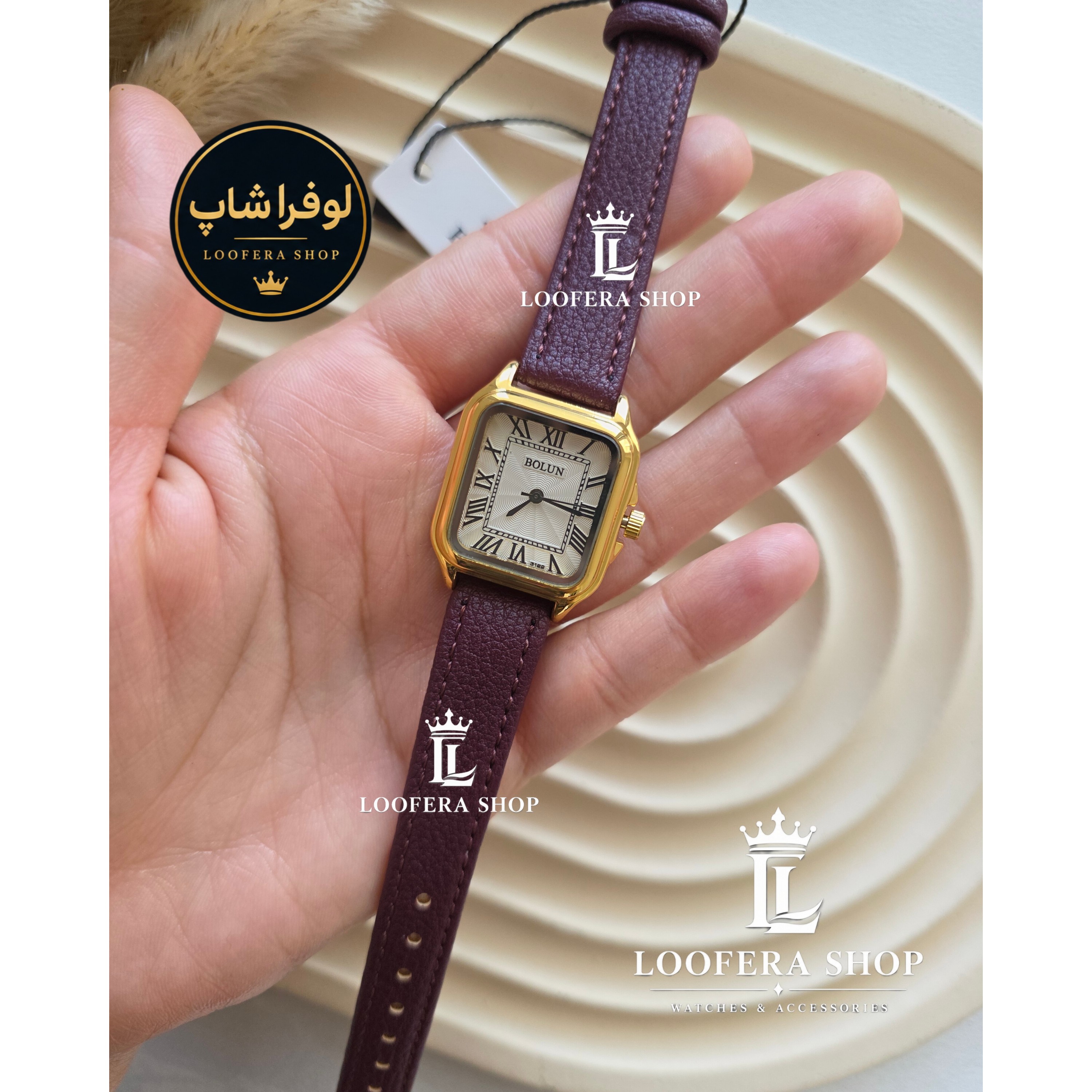 ساعتمچی دخترانه بند چرم بولون طرح کارتیر زرشکی