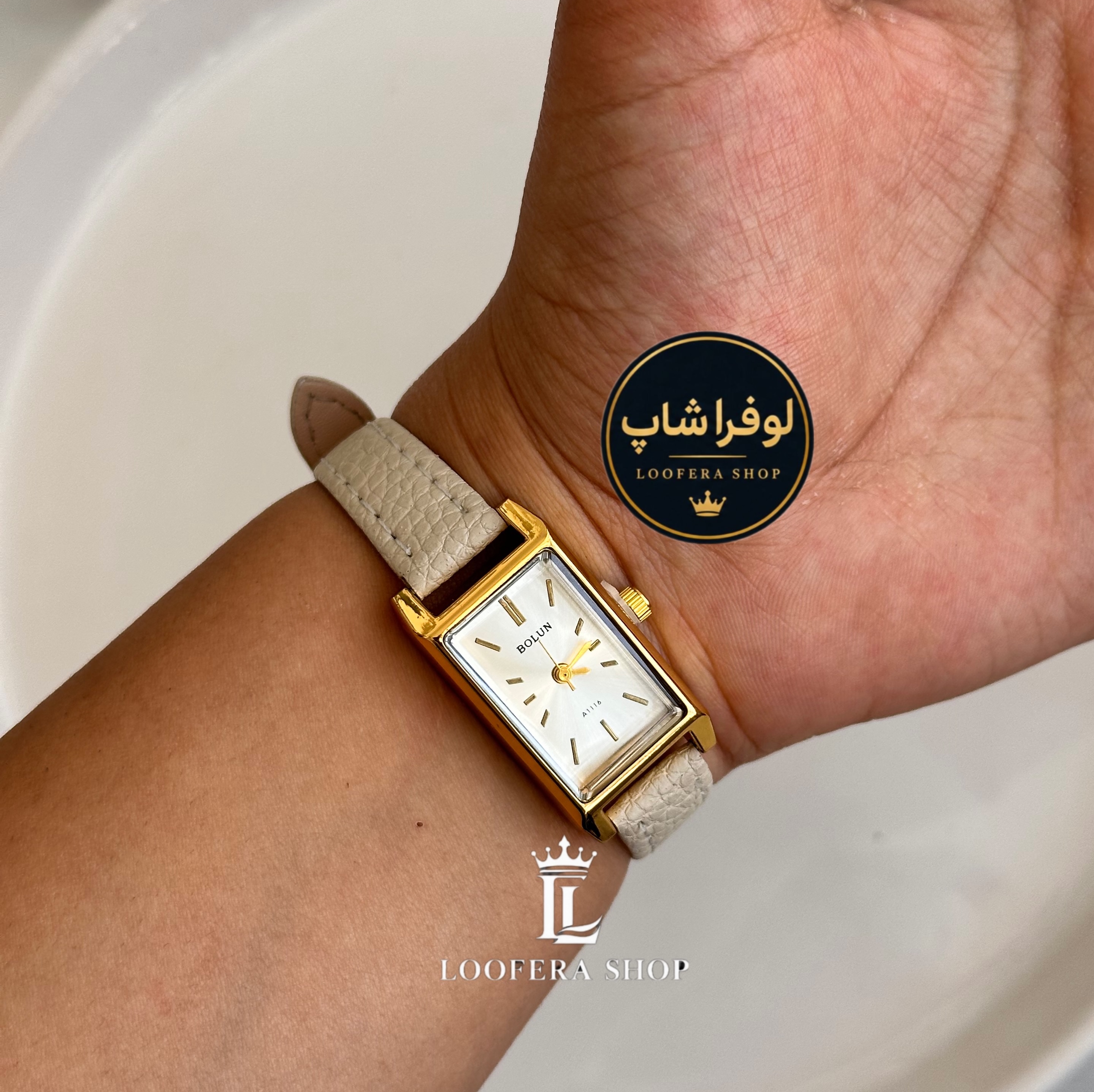 ساعت بولون دخترانه بند چرم صفحه سفید کرمی
