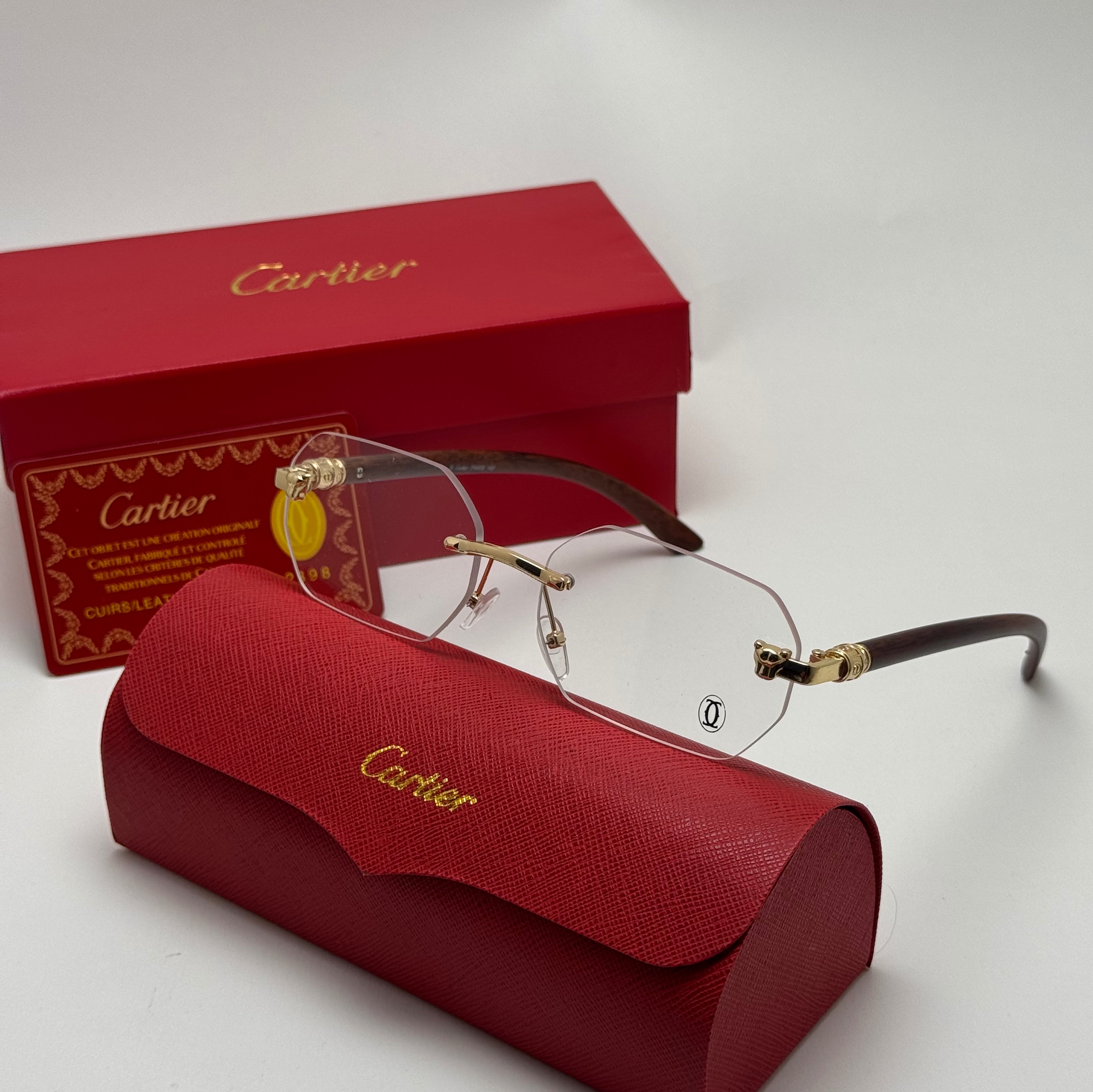 عینک آفتابی و شب کارتیر Cartier فریم لس فتوکرومیک تغییر رنگ عدسی در آفتاب UV400 بلوکات طلایی مشکی دسته طرح چوب