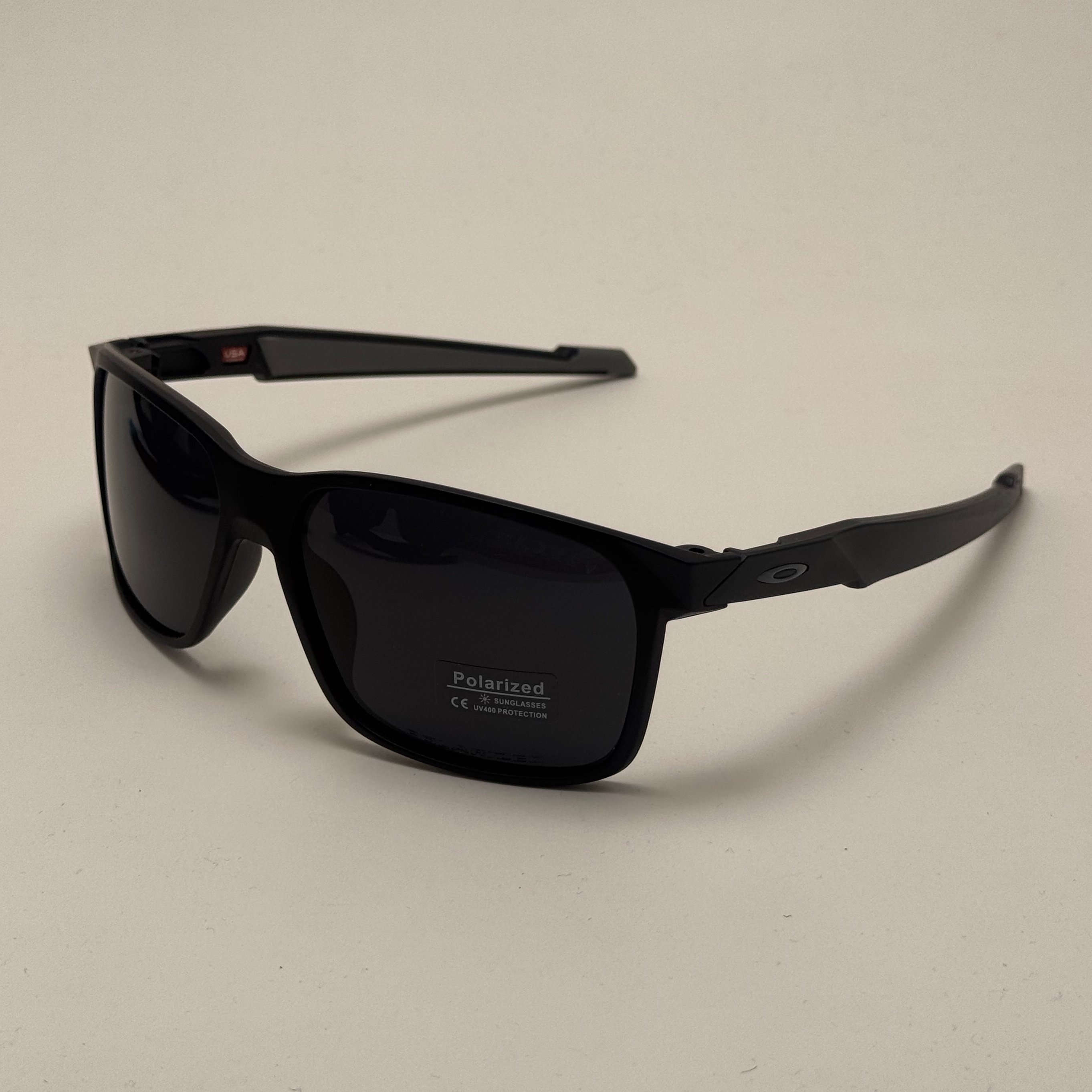عینک آفتابی پلاریزه اوکلی Oakley تمام مشکی مستطیلی کد 25673