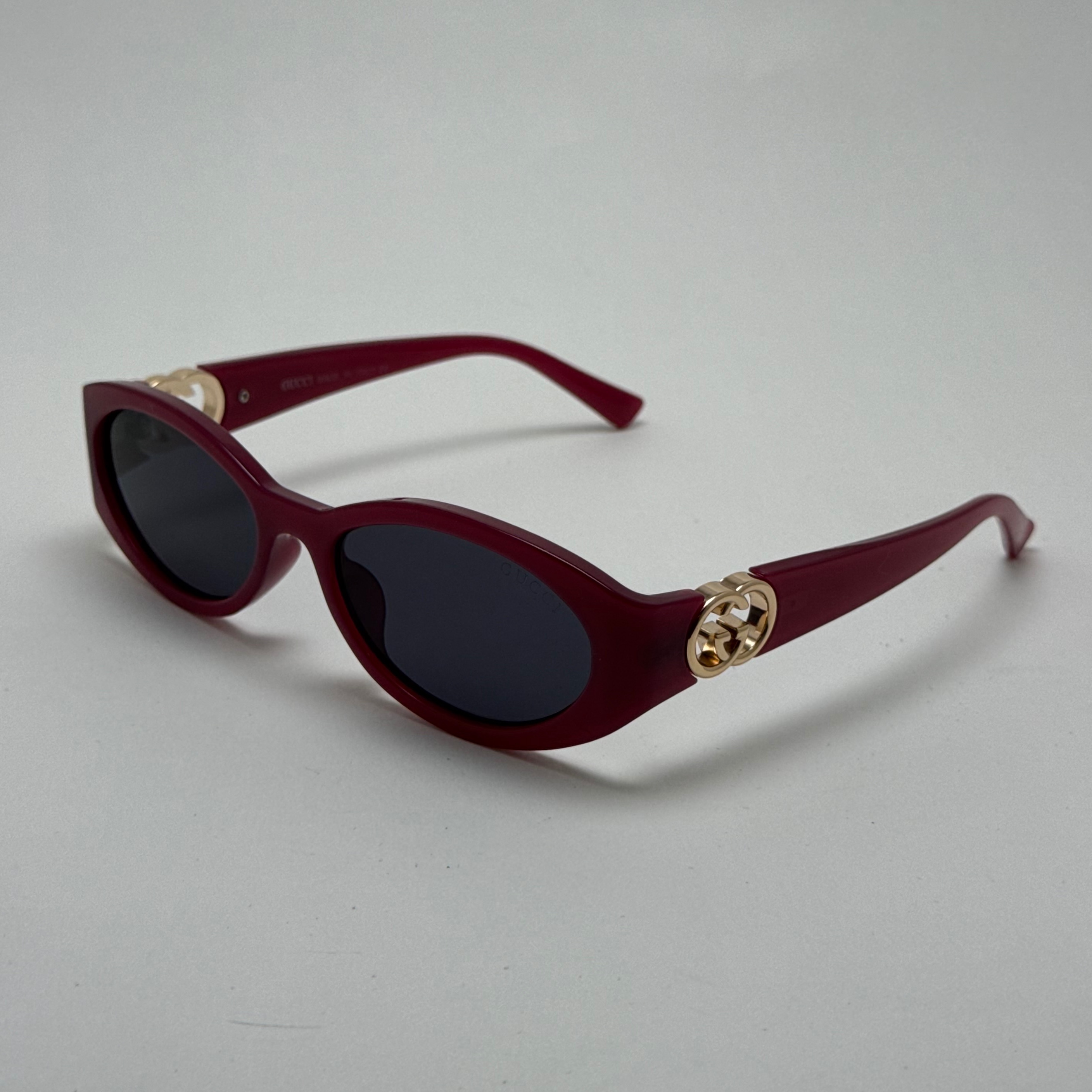 عینک آفتابی گوچی GUCCI بیضی زرشکی - عینک ترند