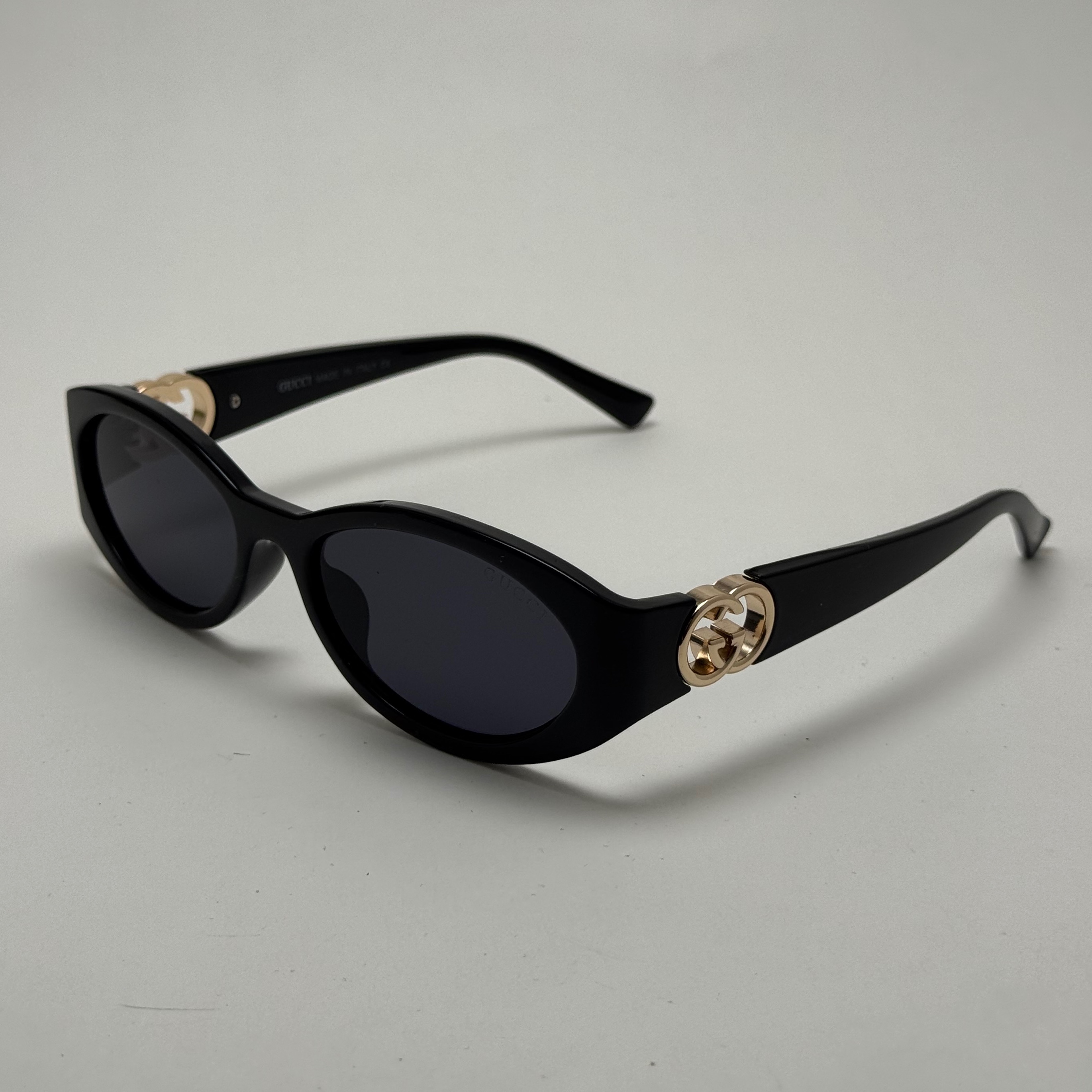 عینک آفتابی گوچی GUCCI بیضی مشکی - عینک ترند